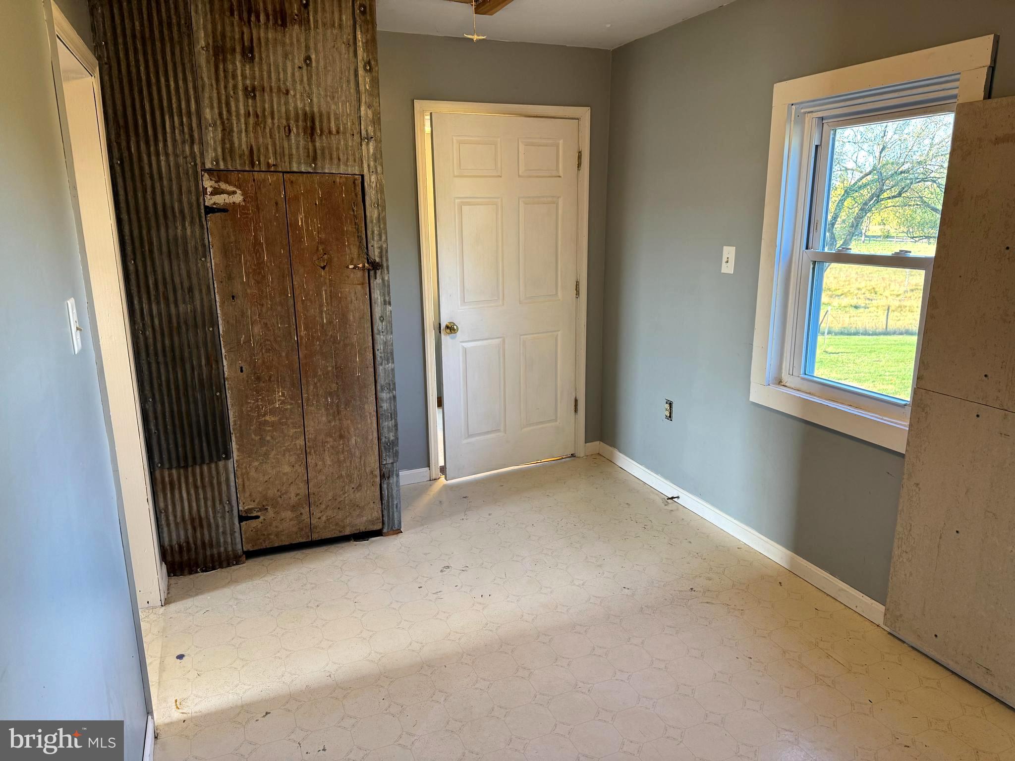 136 Shady Creek Road Clear Brook, VA 22624 - Photo 9 of 22 an empty room with windows and closet