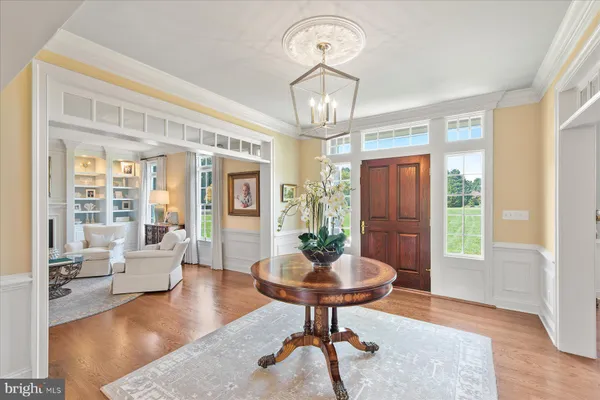 a kitchen with stainless steel appliances granite countertop a stove sink and cabinets