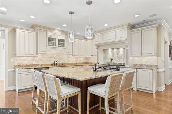 a room with furniture pool table and a window