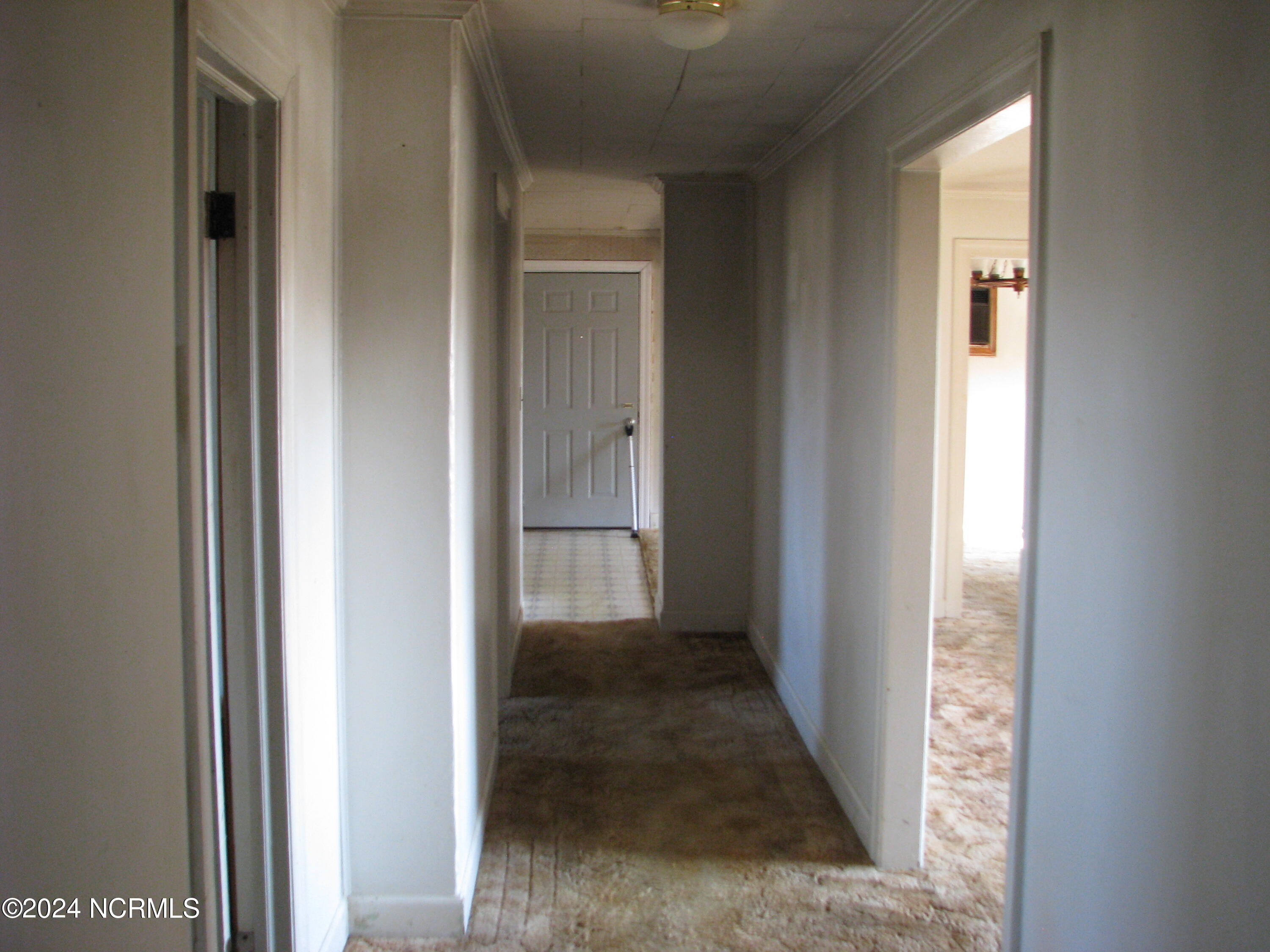 6733 Highway 32 Roper, NC 27970 - Photo 18 of 18 Hallway looking towards the kitchen with entry to living room on right
