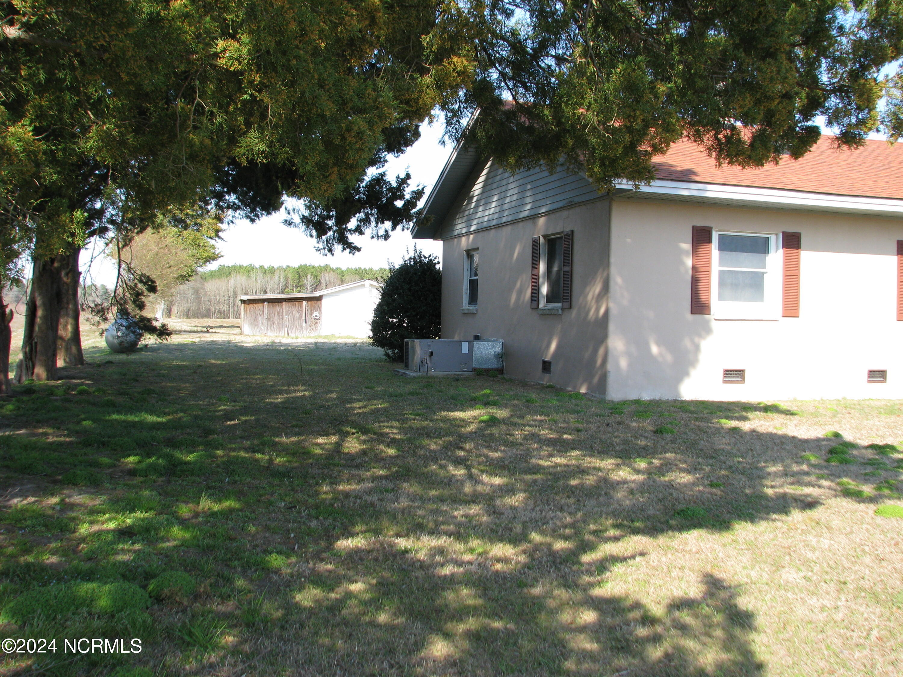 6733 Highway 32 Roper, NC 27970 - Photo 2 of 18 Side yard, peaceful setting