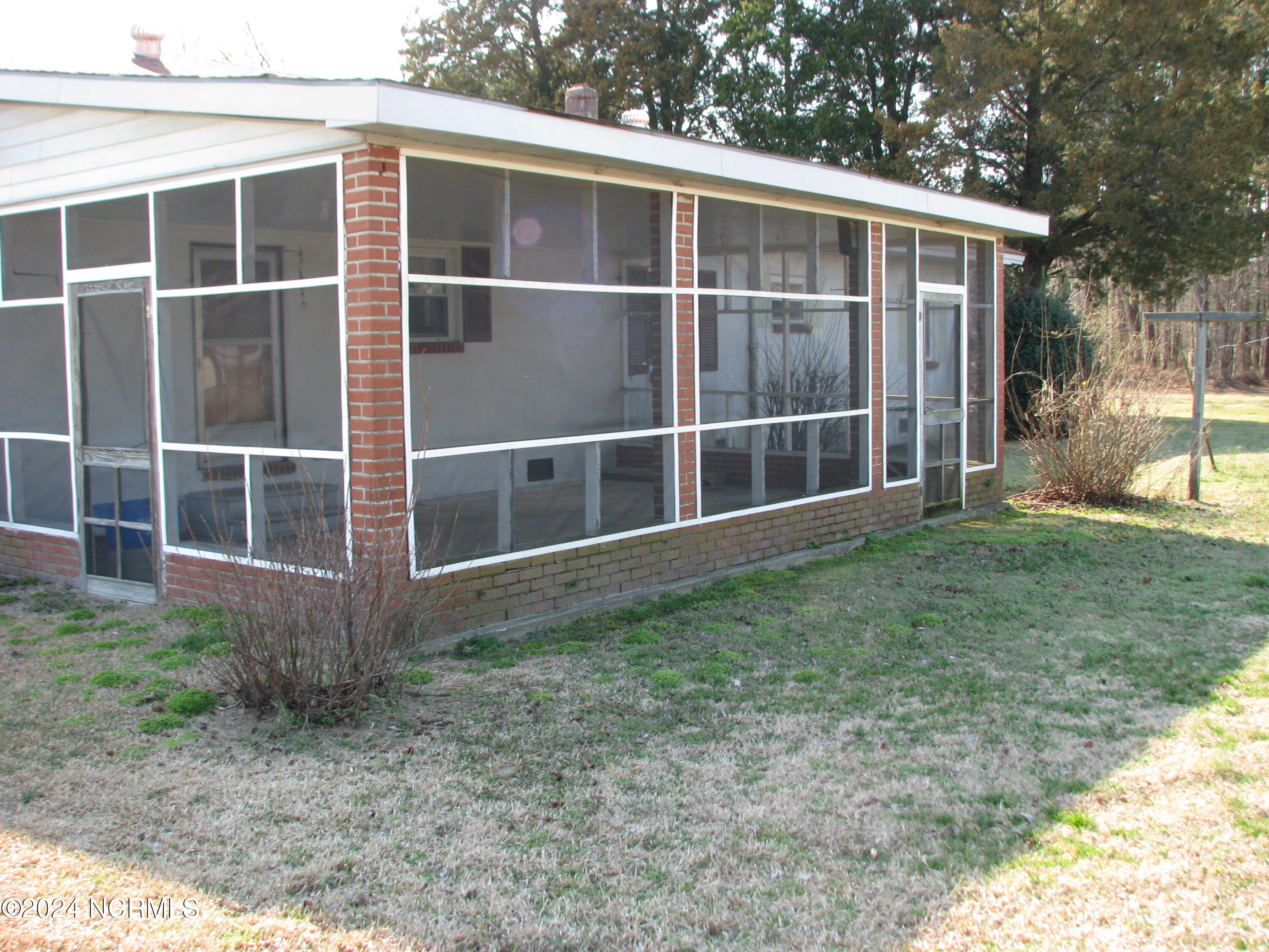 6733 Highway 32 Roper, NC 27970 - Photo 5 of 18 Large screened-in porch on back of house