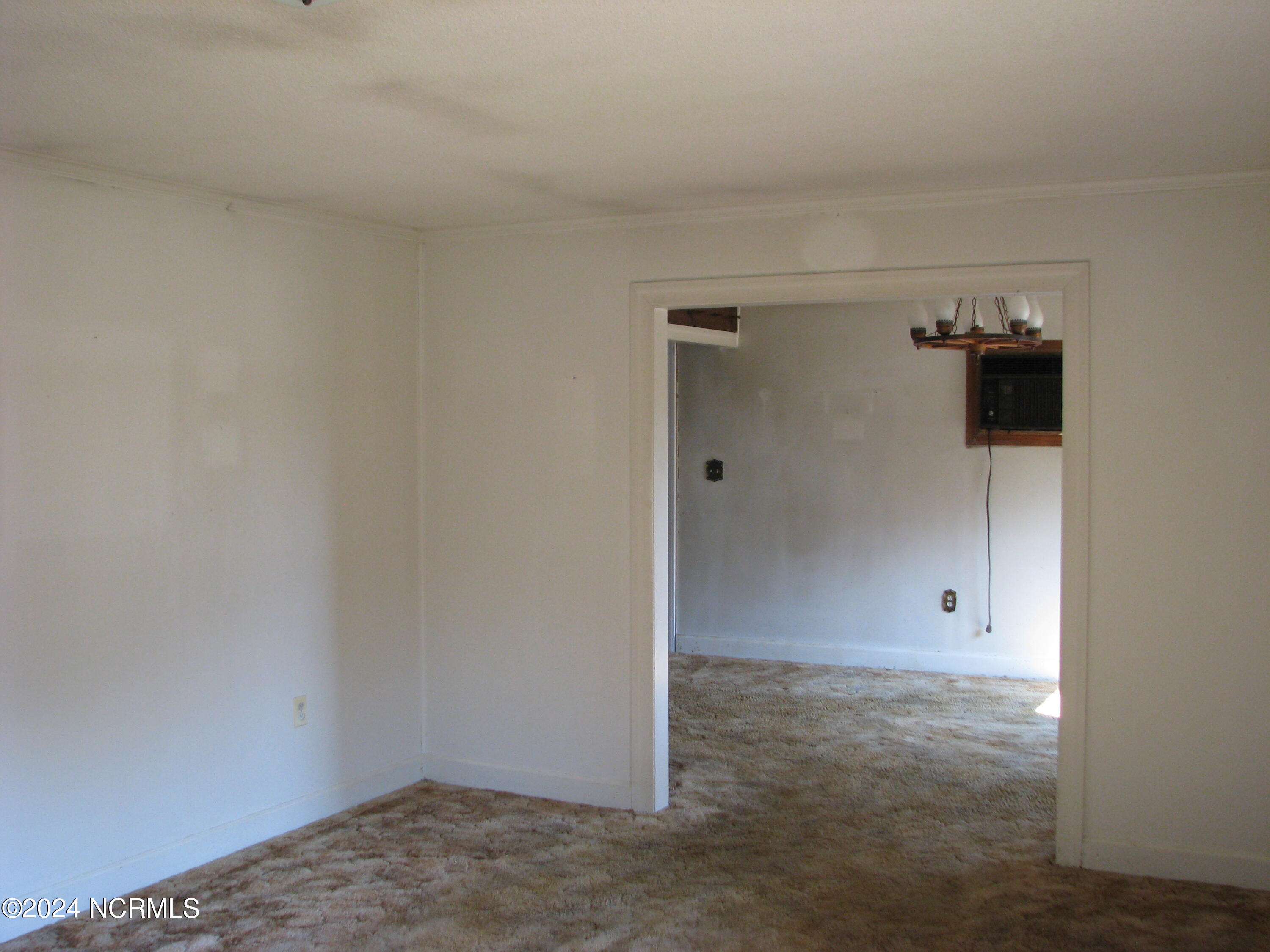 6733 Highway 32 Roper, NC 27970 - Photo 8 of 18 Living room looking towards dining room