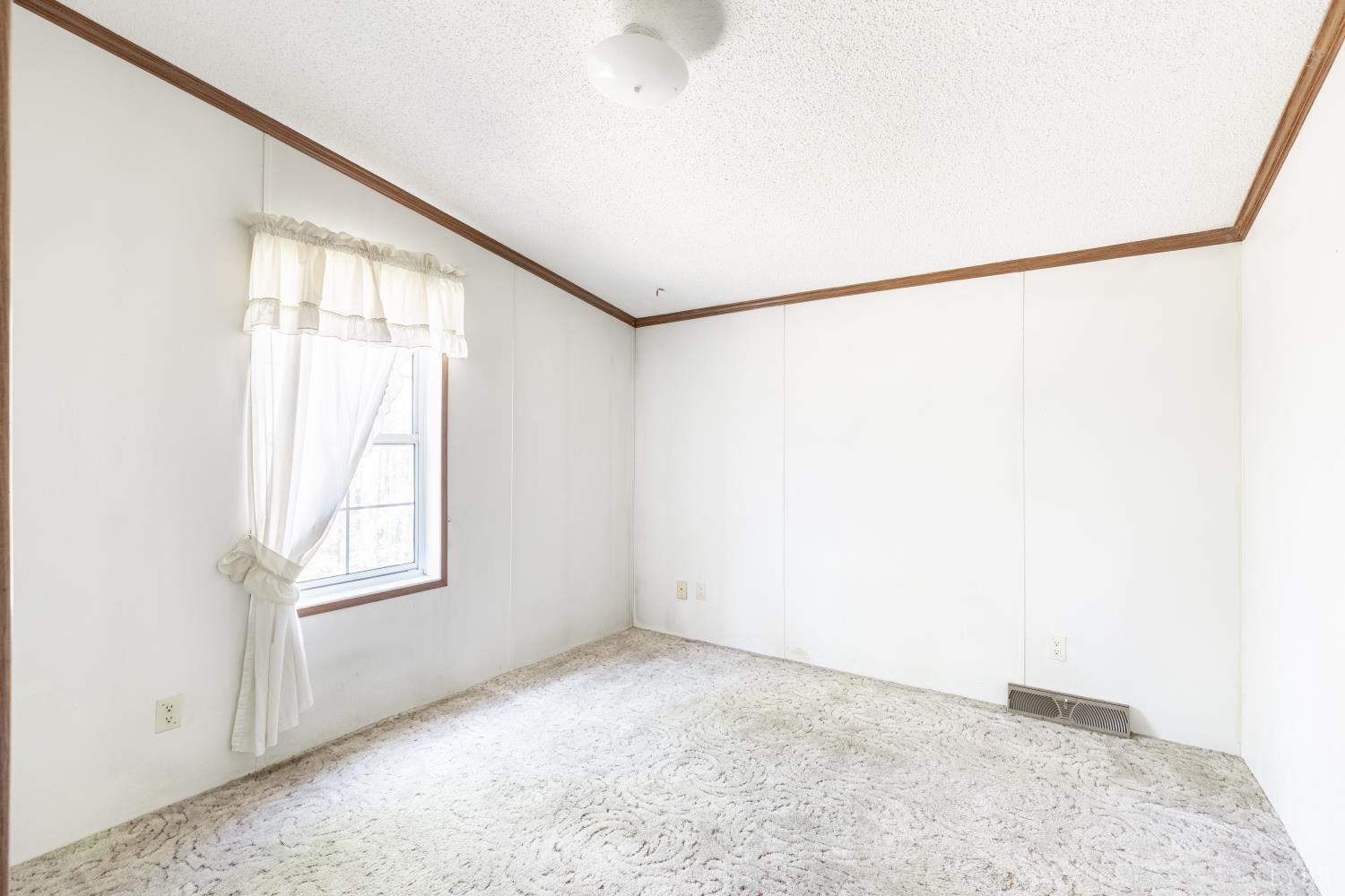 750 Price Lane Pamplin, VA 23958 - Photo 24 of 59 a view of an empty room with a window
