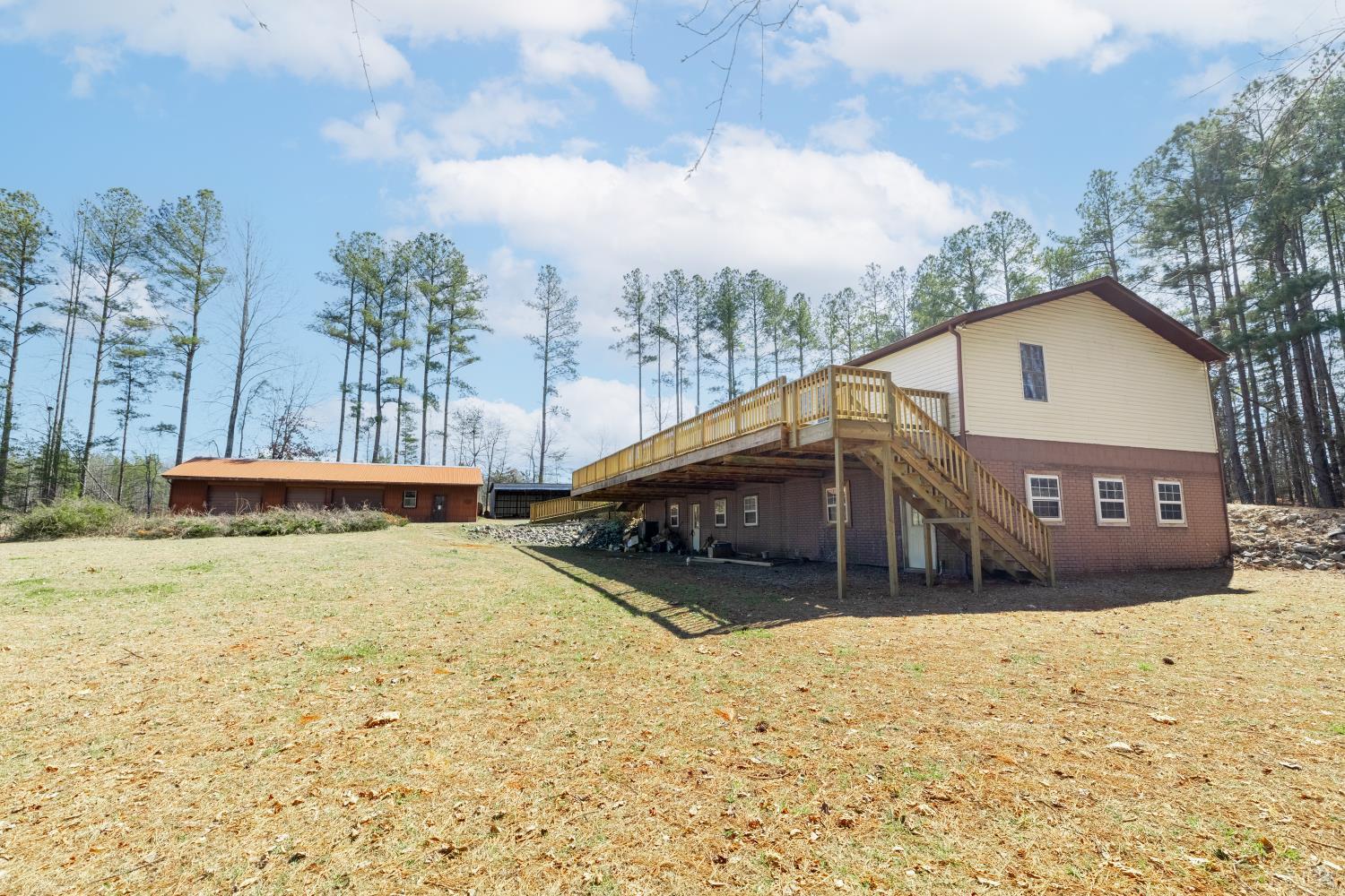 750 Price Lane Pamplin, VA 23958 - Photo 39 of 59 a view of a house with a yard covered in snow