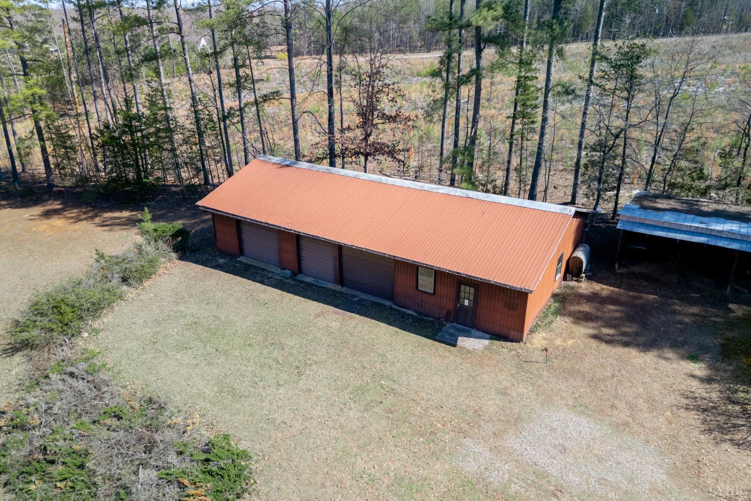 750 Price Lane Pamplin, VA 23958 - Photo 48 of 59 a bed sitting in middle of tall trees