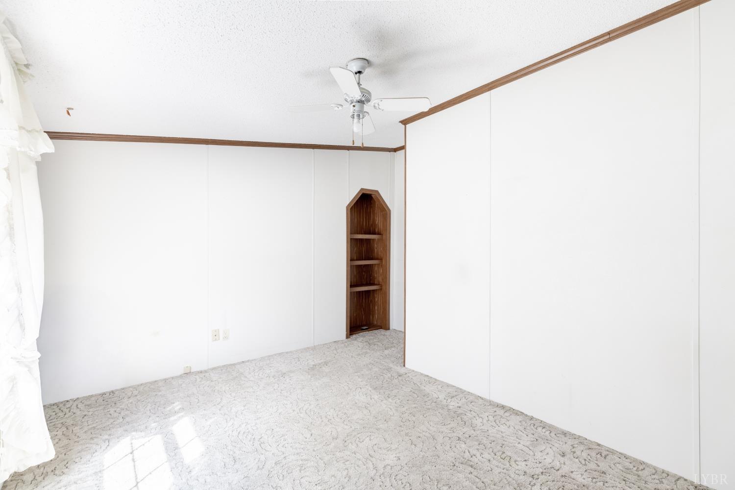 750 Price Lane Pamplin, VA 23958 - Photo 9 of 59 a view of a room with a ceiling fan and a window