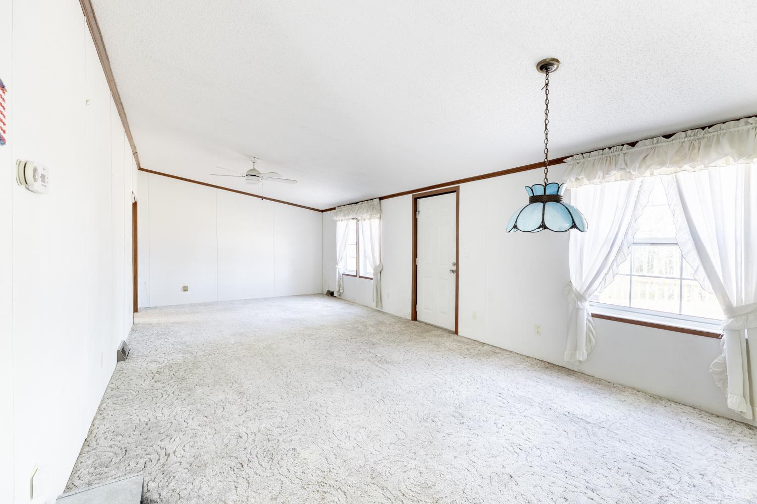 750 Price Lane Pamplin, VA 23958 - Photo 10 of 59 a view of an empty room with windows