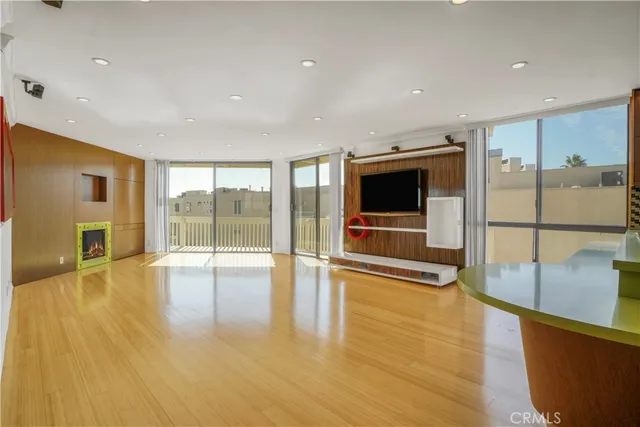a view of a living room with a flat screen tv