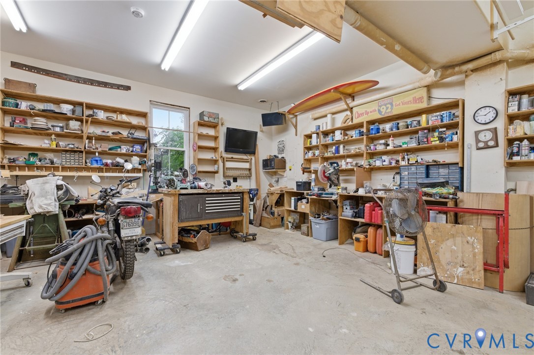 9562 Graves Road Petersburg, VA 23803 - Photo 38 of 54 Large garage set up for workshop with designated 2