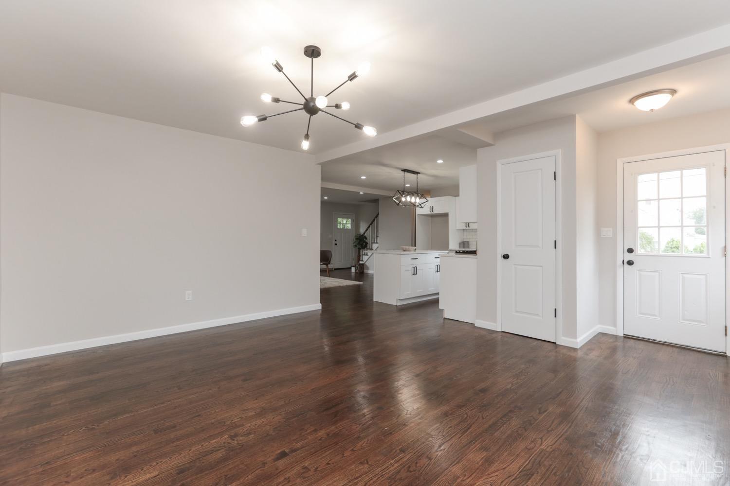 50 Hillcrest Road Colonia, NJ 07067 - Photo 7 of 24 a view of a kitchen with wooden floor and a cabinet