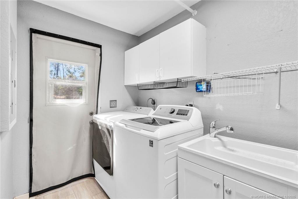 8401 Southwest Fox Brown Road Indiantown, FL 34956 - Photo 41 of 56 Main laundry