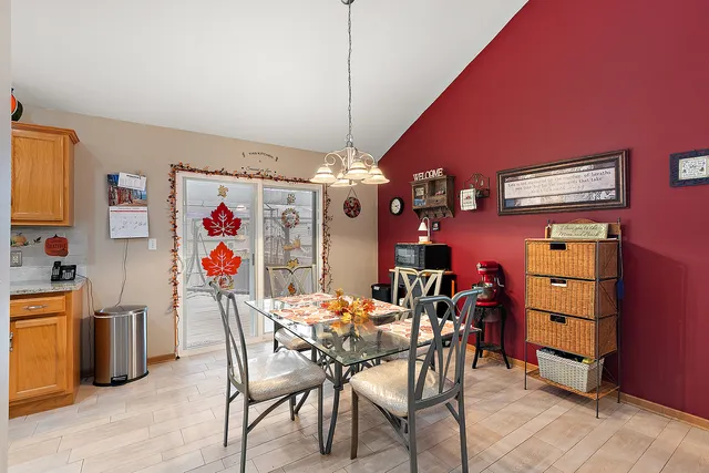 a bathroom with a sink a large mirror and a bathtub