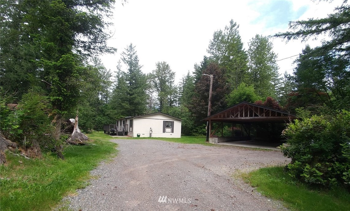 40805 Dorman Road Gold Bar, WA 98251 - Photo 3 of 25 a view of house with outdoor space and garden