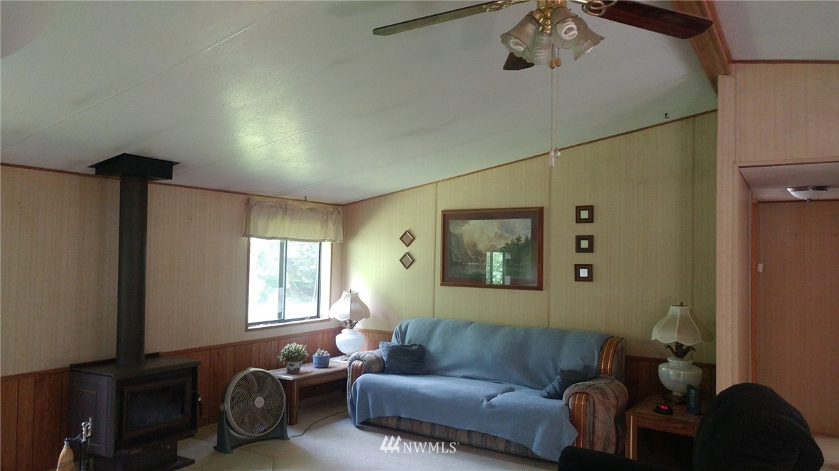 40805 Dorman Road Gold Bar, WA 98251 - Photo 6 of 25 a living room with furniture and a window