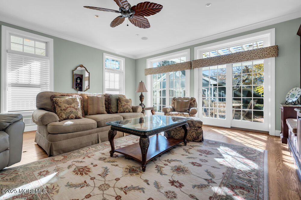 412 Chicago Boulevard Sea Girt, NJ 08750 - Photo 9 of 47 a living room with furniture and a large window