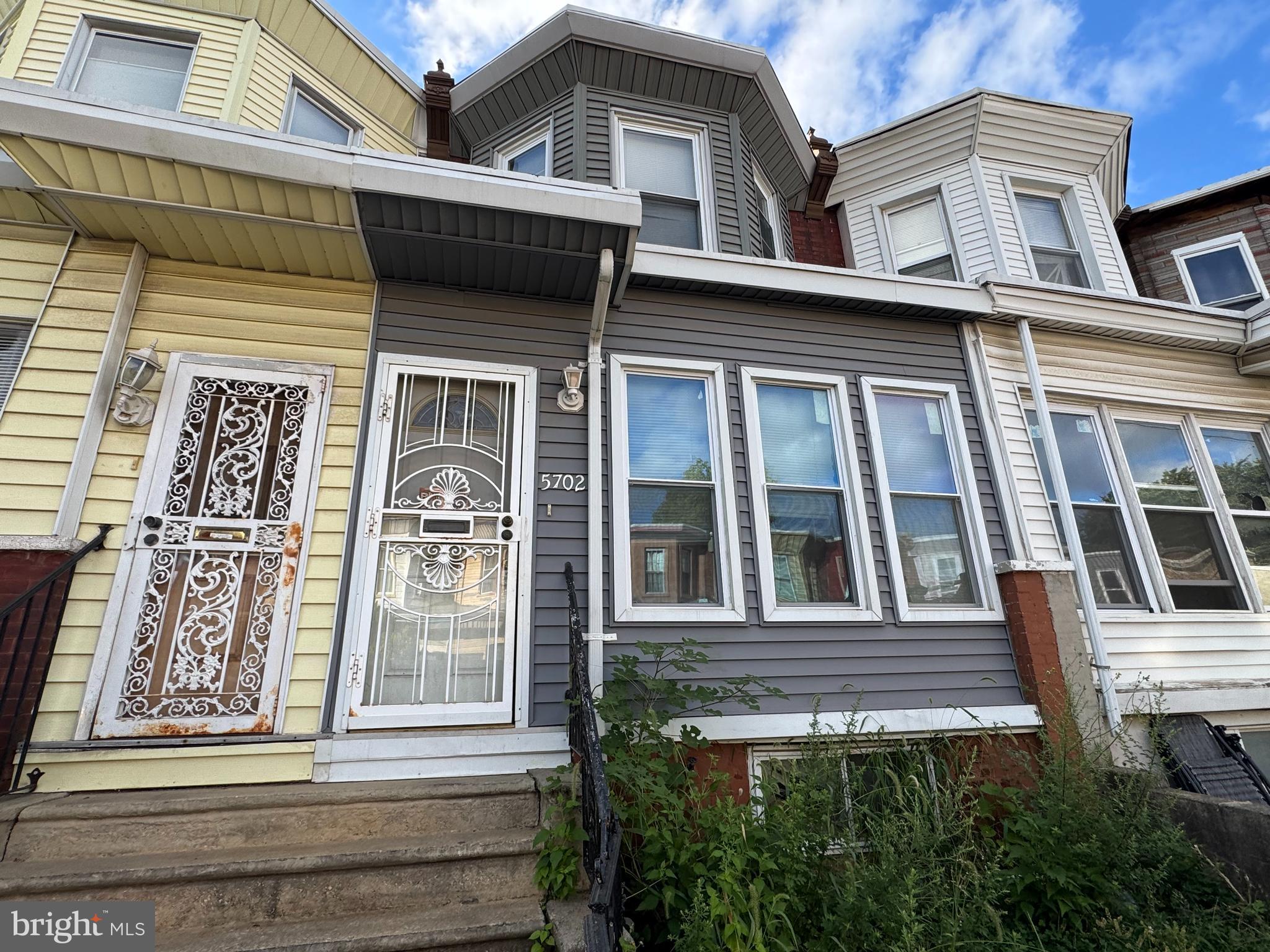 5702 Belmar Street Philadelphia, PA 19143 - Photo 1 of 14 a view of a house with a entrance