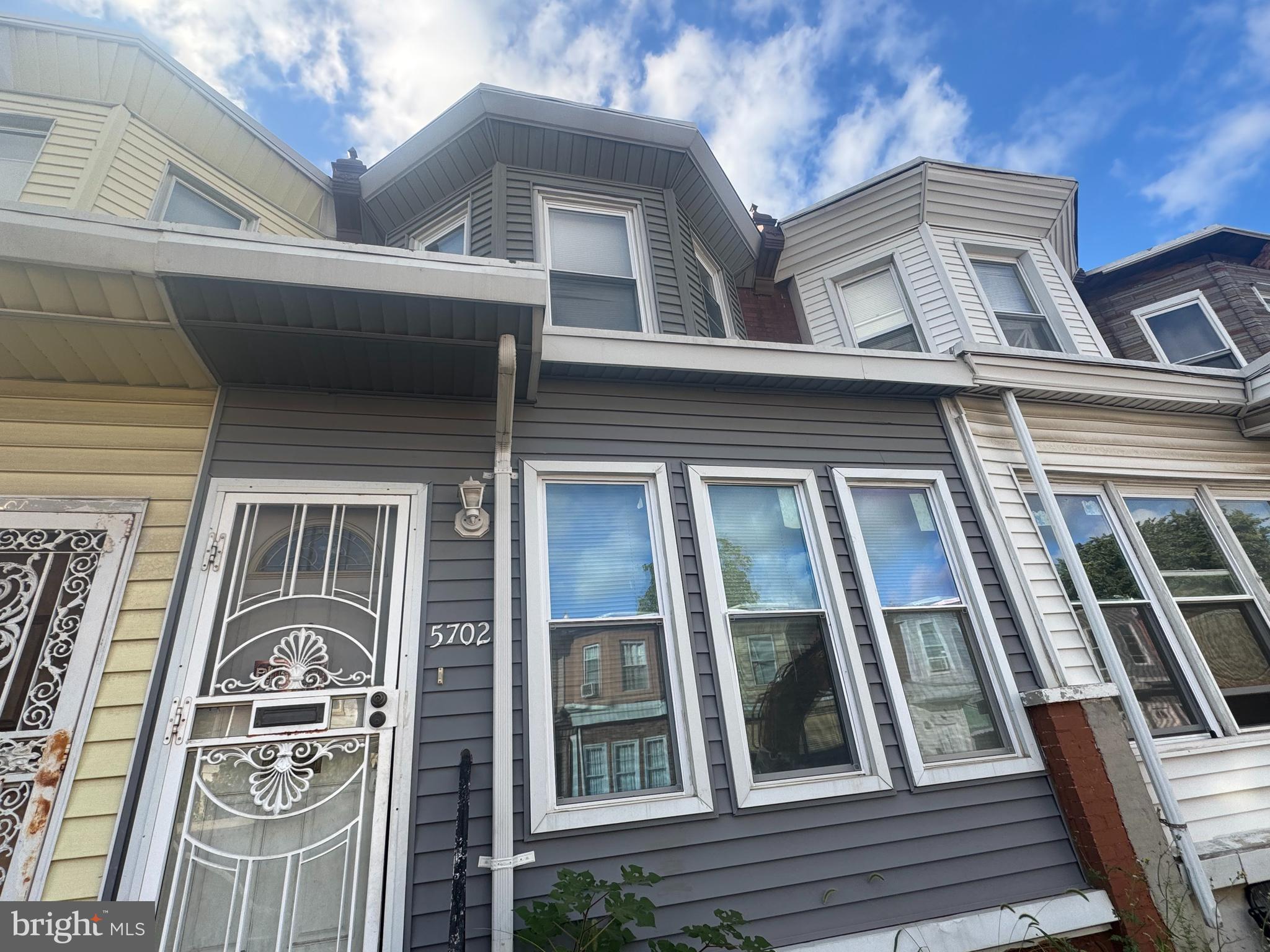5702 Belmar Street Philadelphia, PA 19143 - Photo 2 of 14 a front view of a building