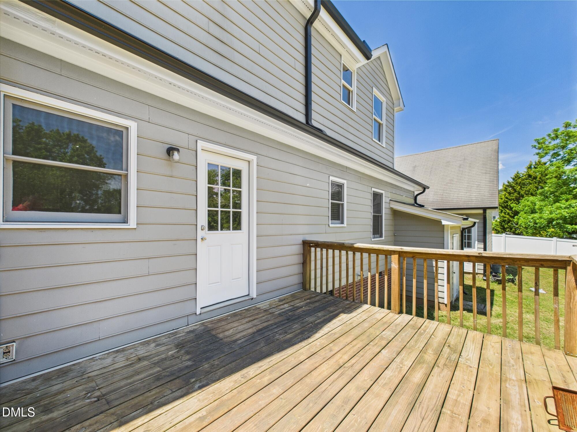 10917 Fanny Brown Road Raleigh, NC 27603 - Photo 42 of 54 a view of a wooden deck