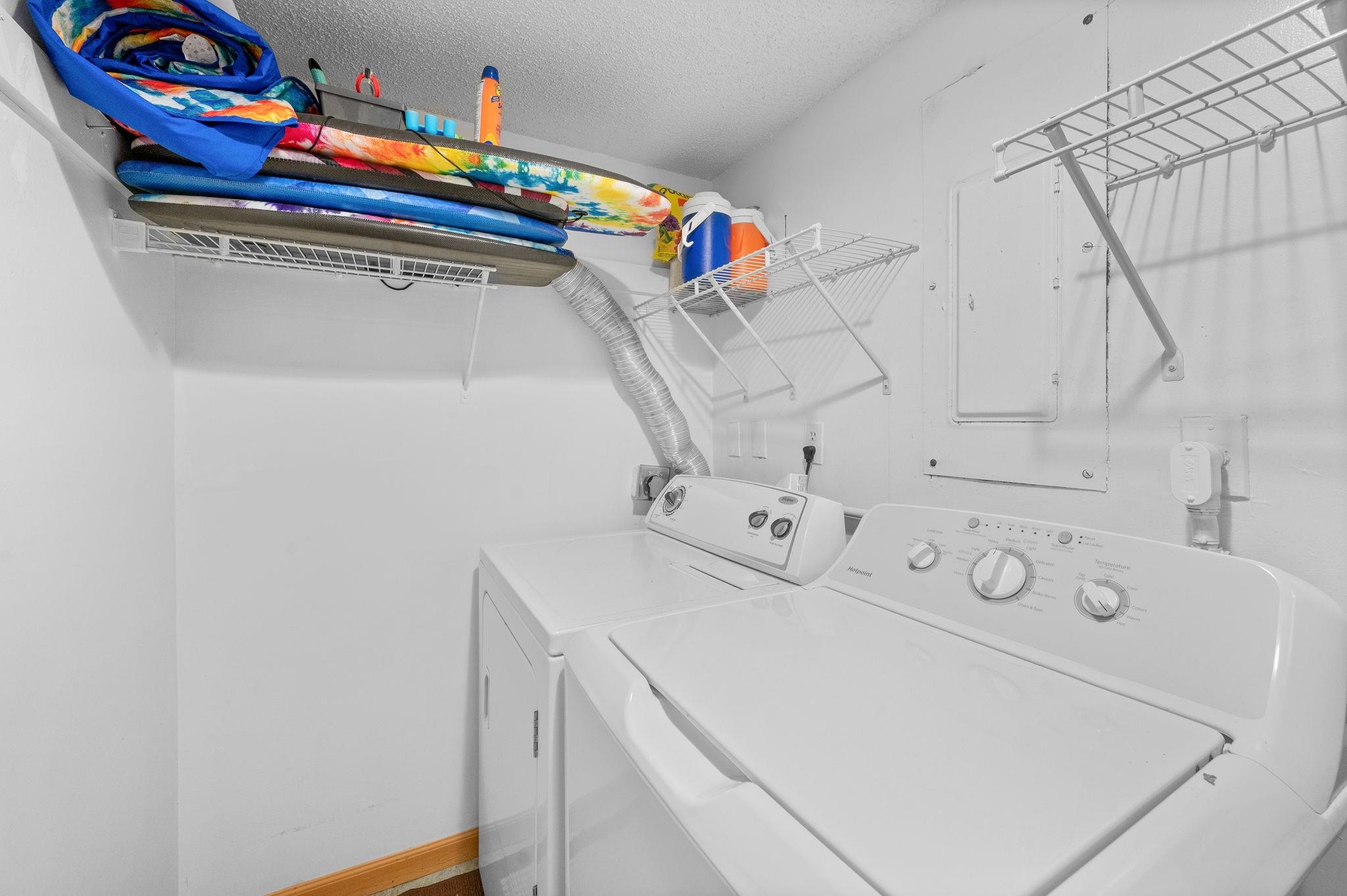 7175 A1A South, Unit F237 St. Augustine, FL 32080 - Photo 16 of 63 a utility room with dryer and washer