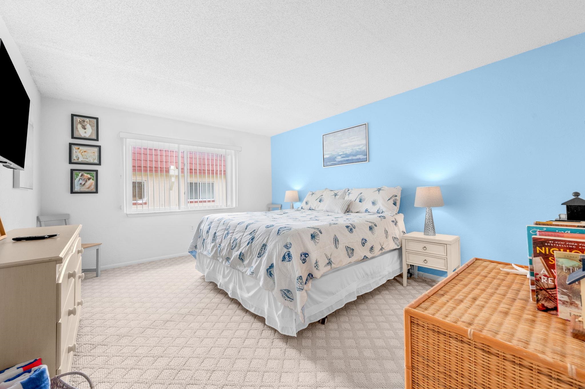 7175 A1A South, Unit F237 St. Augustine, FL 32080 - Photo 19 of 63 a bedroom with bed and a couch