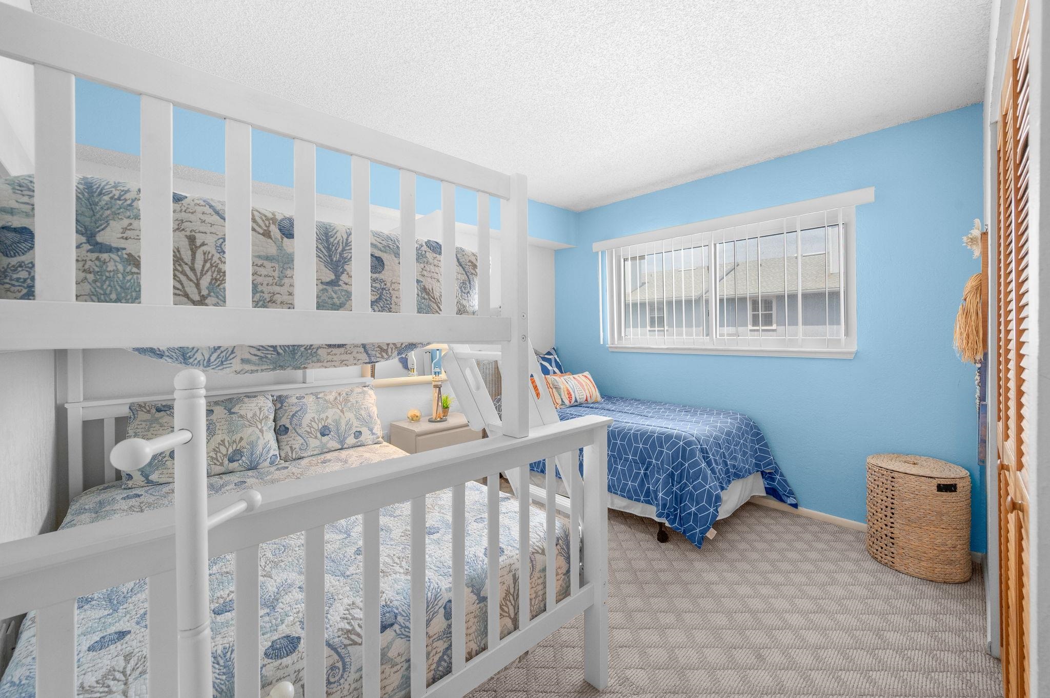 7175 A1A South, Unit F237 St. Augustine, FL 32080 - Photo 26 of 63 a bedroom with furniture and a large window