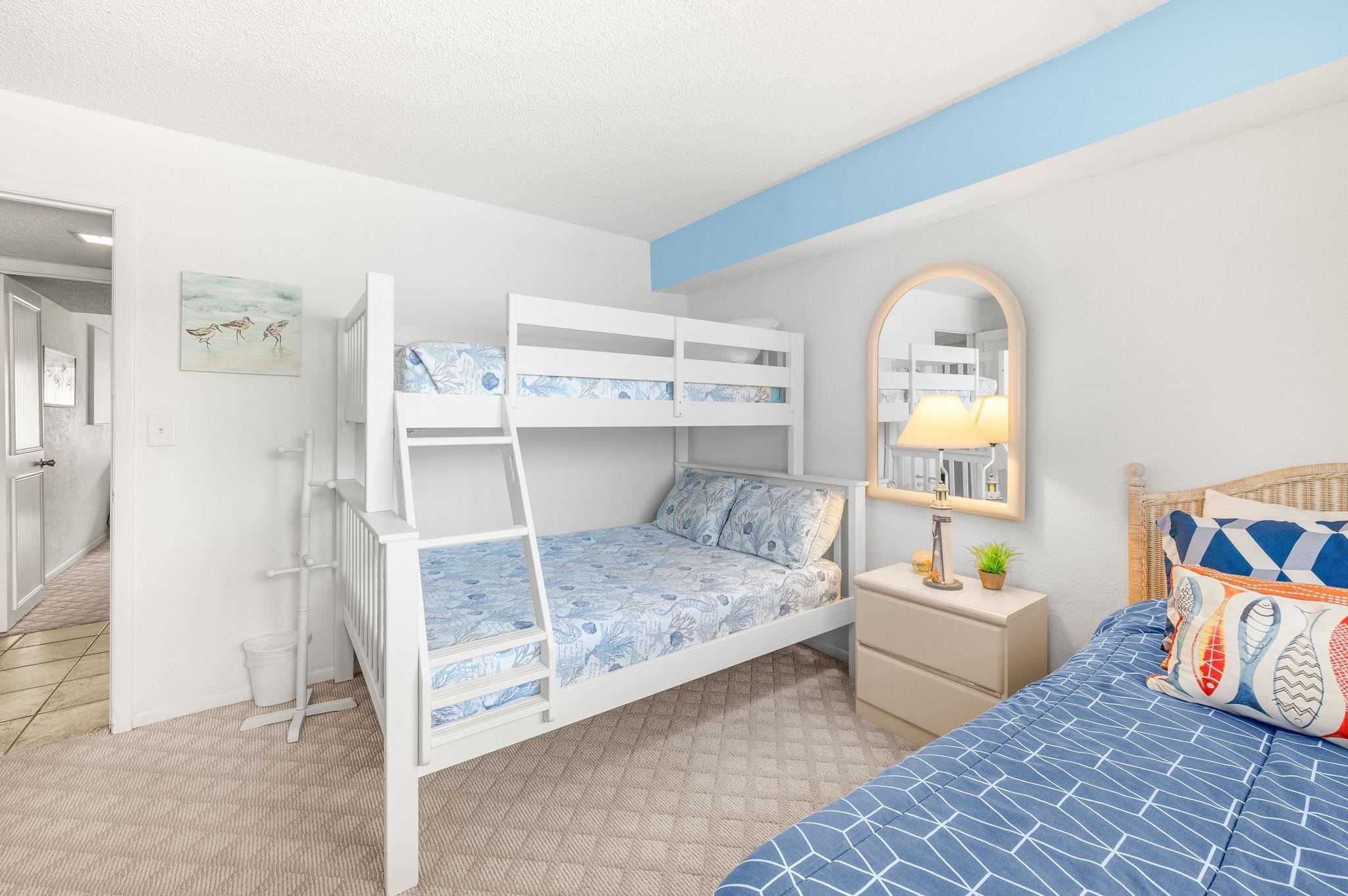 7175 A1A South, Unit F237 St. Augustine, FL 32080 - Photo 27 of 63 a bedroom with a bed and a window