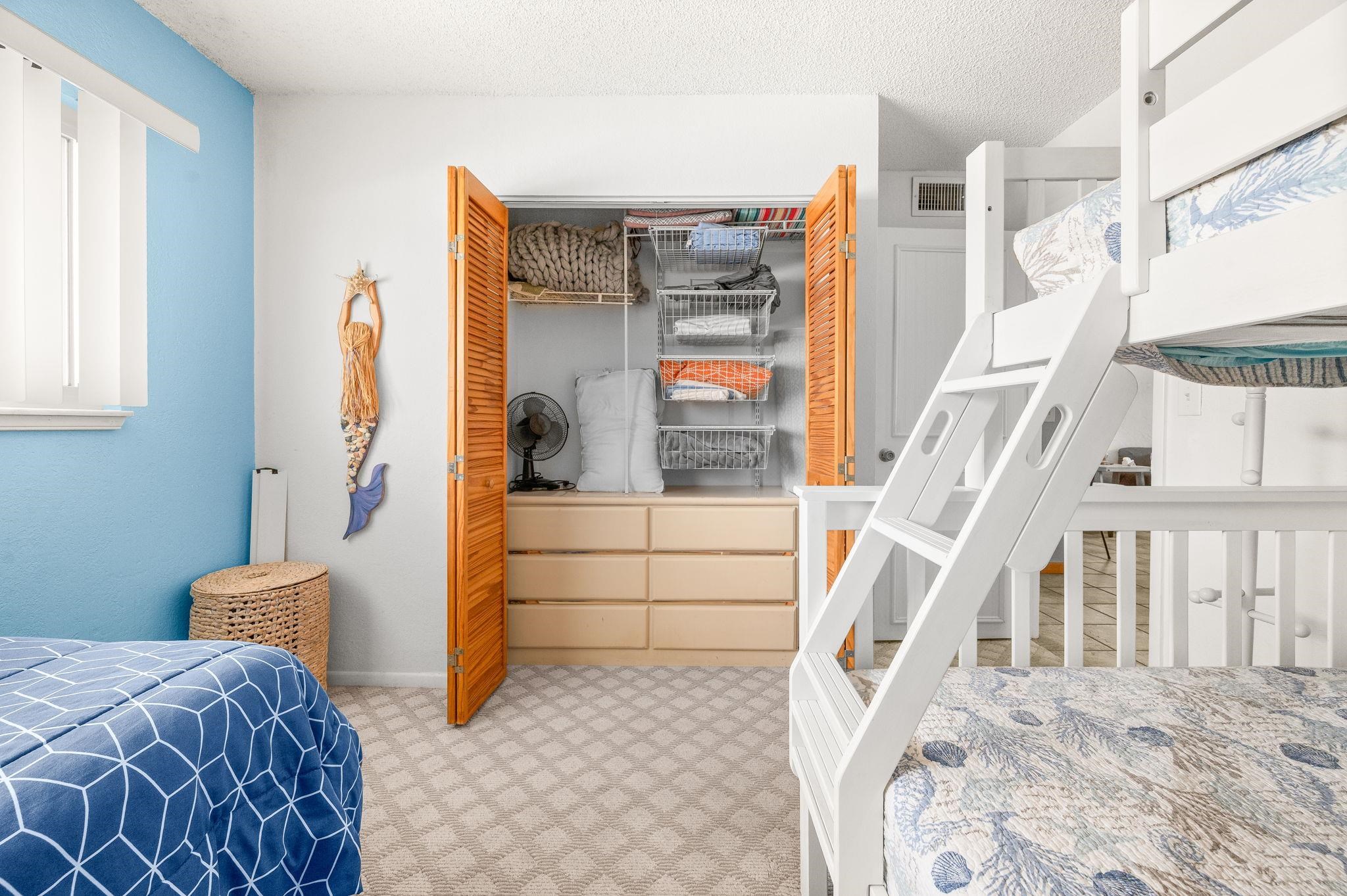 7175 A1A South, Unit F237 St. Augustine, FL 32080 - Photo 29 of 63 a view of a bedroom with furniture and staircase