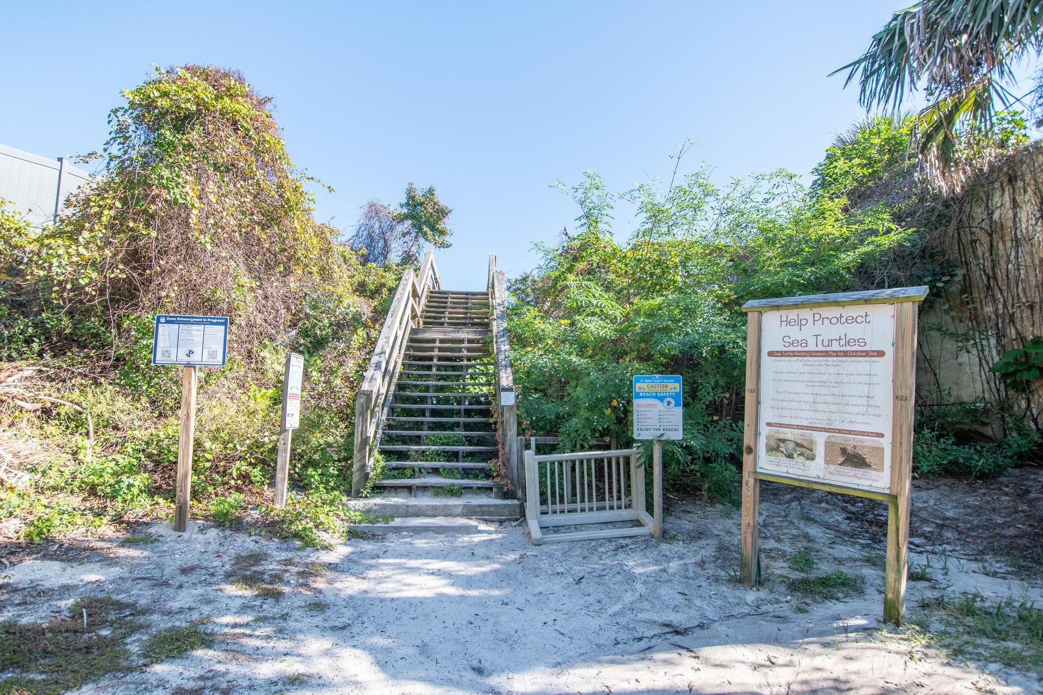 7175 A1A South, Unit F237 St. Augustine, FL 32080 - Photo 47 of 63 a view of a house with a yard and potted plants