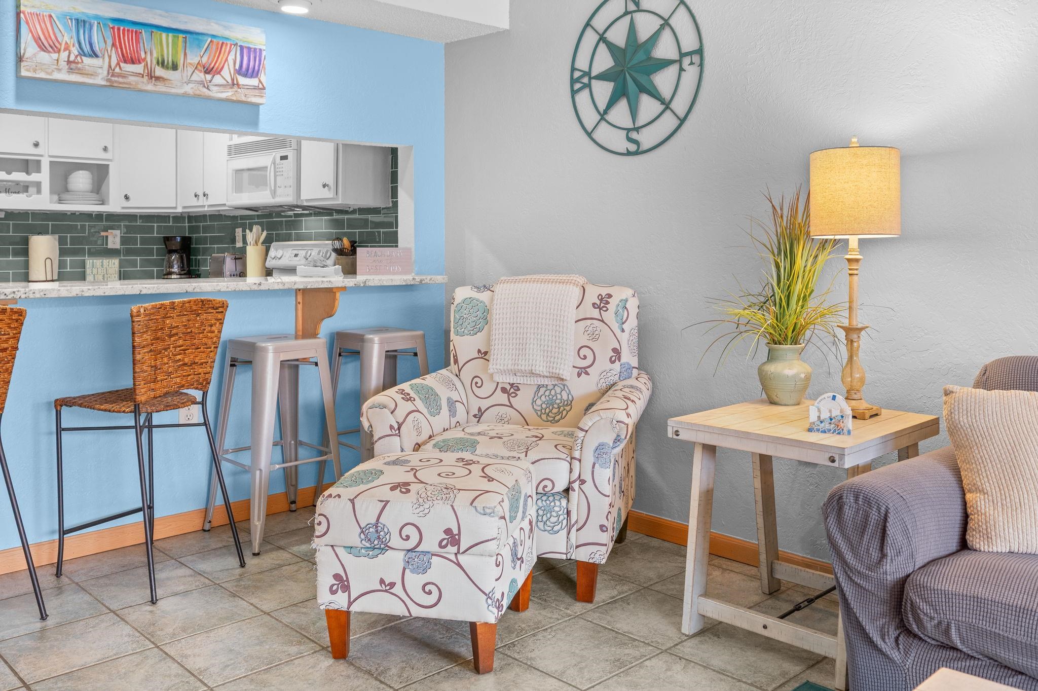 7175 A1A South, Unit F237 St. Augustine, FL 32080 - Photo 9 of 63 a living room with stainless steel appliances furniture a rug and a window