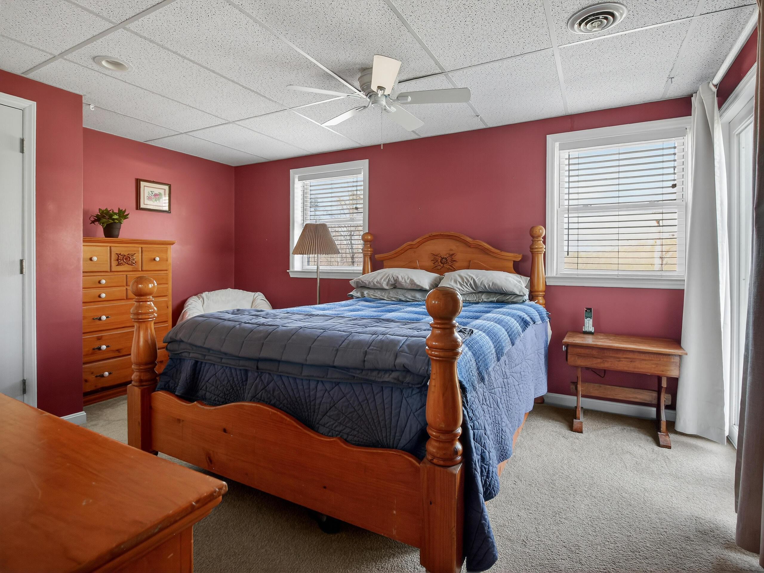 498 Meeks Road Penhook, VA 24137 - Photo 36 of 74 a bedroom with a bed and a dresser