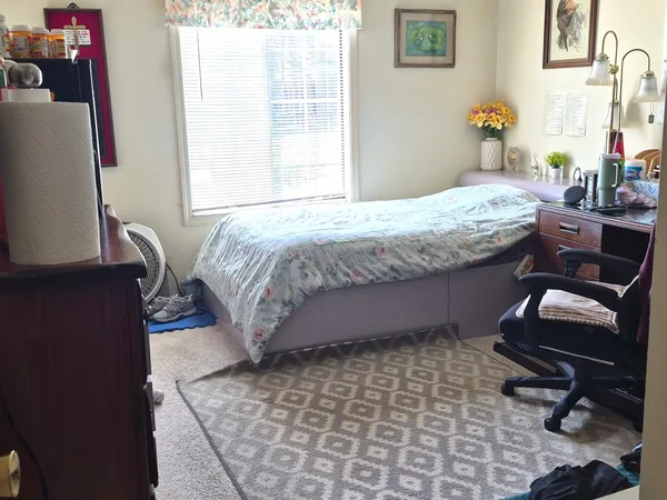 a kitchen with a dining table and chairs