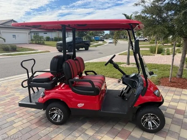 a view of swimming pool with outdoor seating