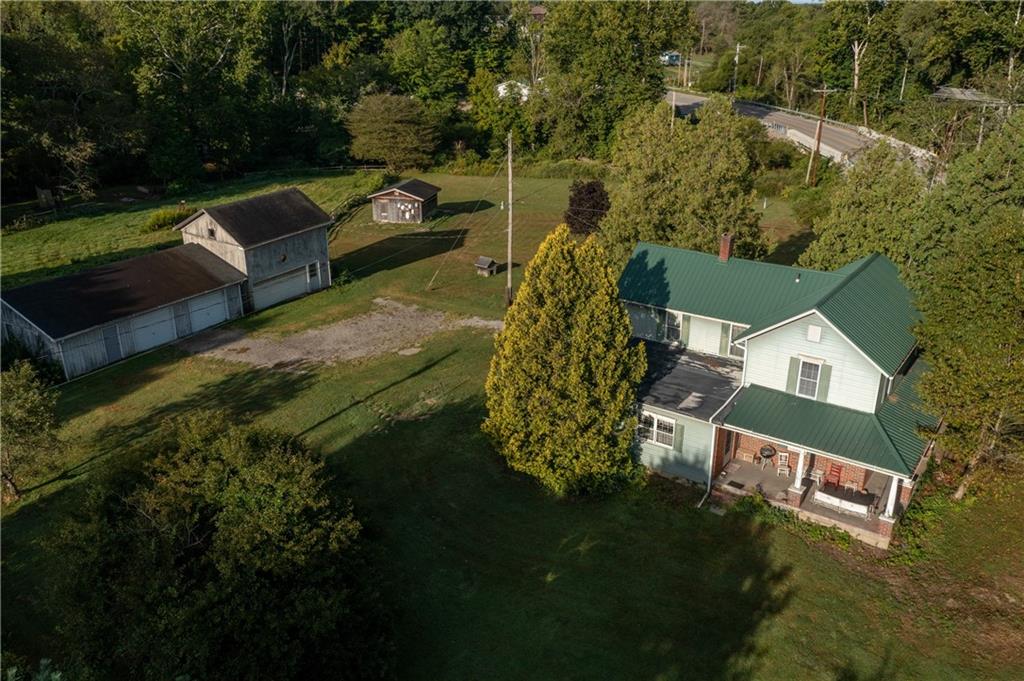 1120 Fredonia Road Hadley, PA 16130 - Photo 1 of 23 an aerial view of a house with a yard