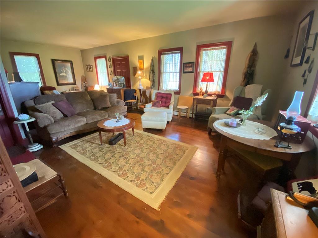 1120 Fredonia Road Hadley, PA 16130 - Photo 14 of 23 a living room with furniture and a couch