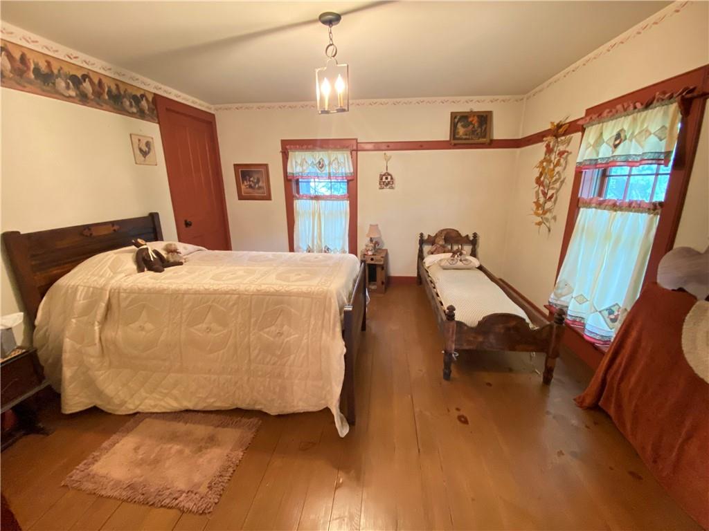 1120 Fredonia Road Hadley, PA 16130 - Photo 21 of 23 a bedroom with bed and window