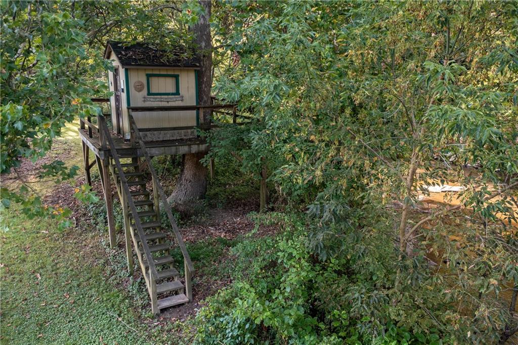 1120 Fredonia Road Hadley, PA 16130 - Photo 5 of 23 a backyard of a house with table and chairs