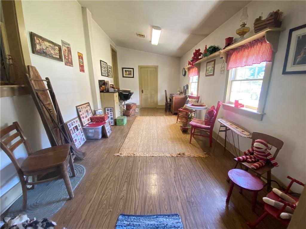 1120 Fredonia Road Hadley, PA 16130 - Photo 10 of 23 a living room with furniture and wooden floor