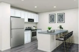 a bathroom with a sink toilet and a mirror