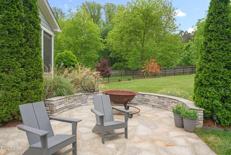 a view of a backyard with a garden