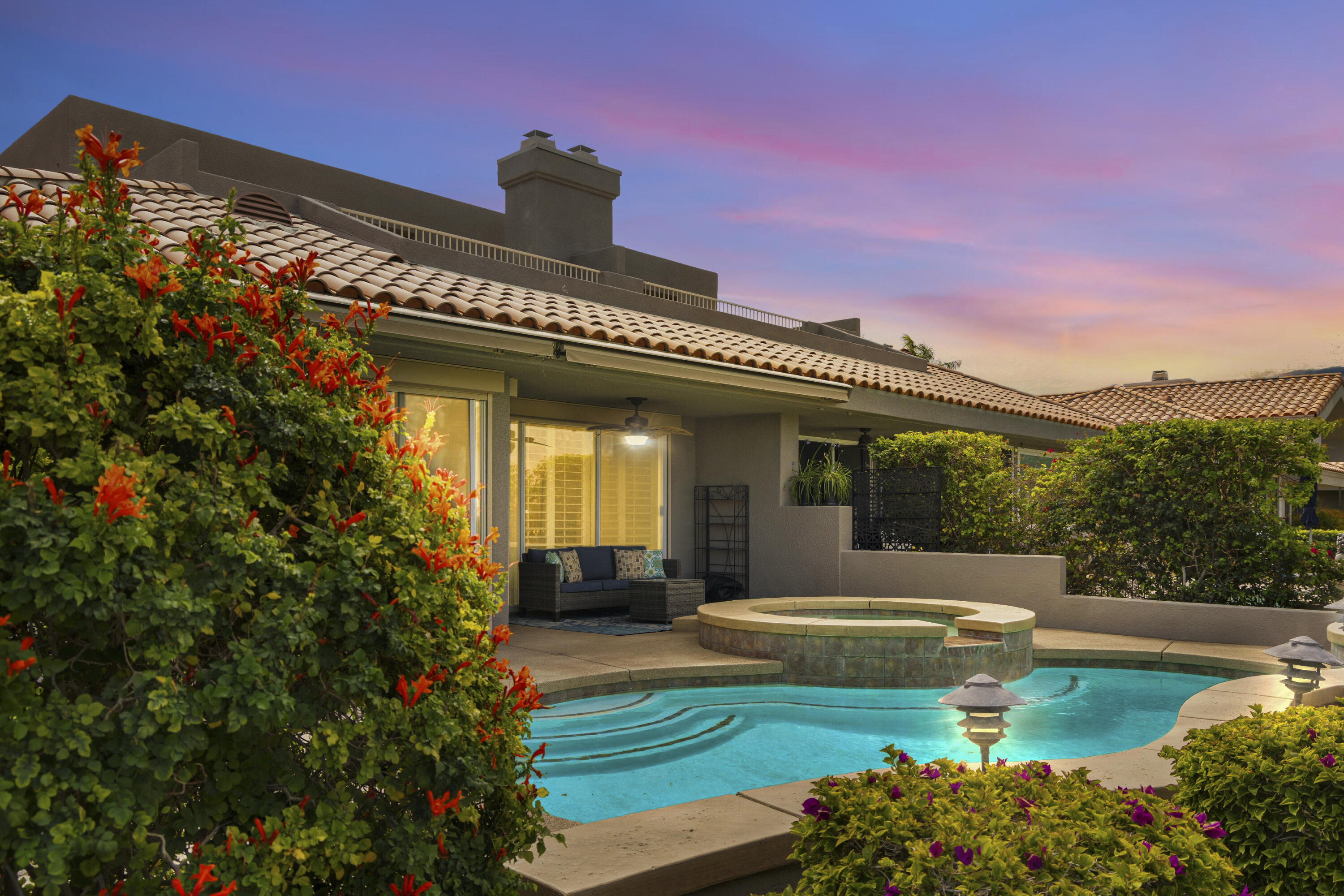 39 Augusta Drive Rancho Mirage, CA 92270 - Photo 42 of 53 a view of a house with swimming pool garden and patio