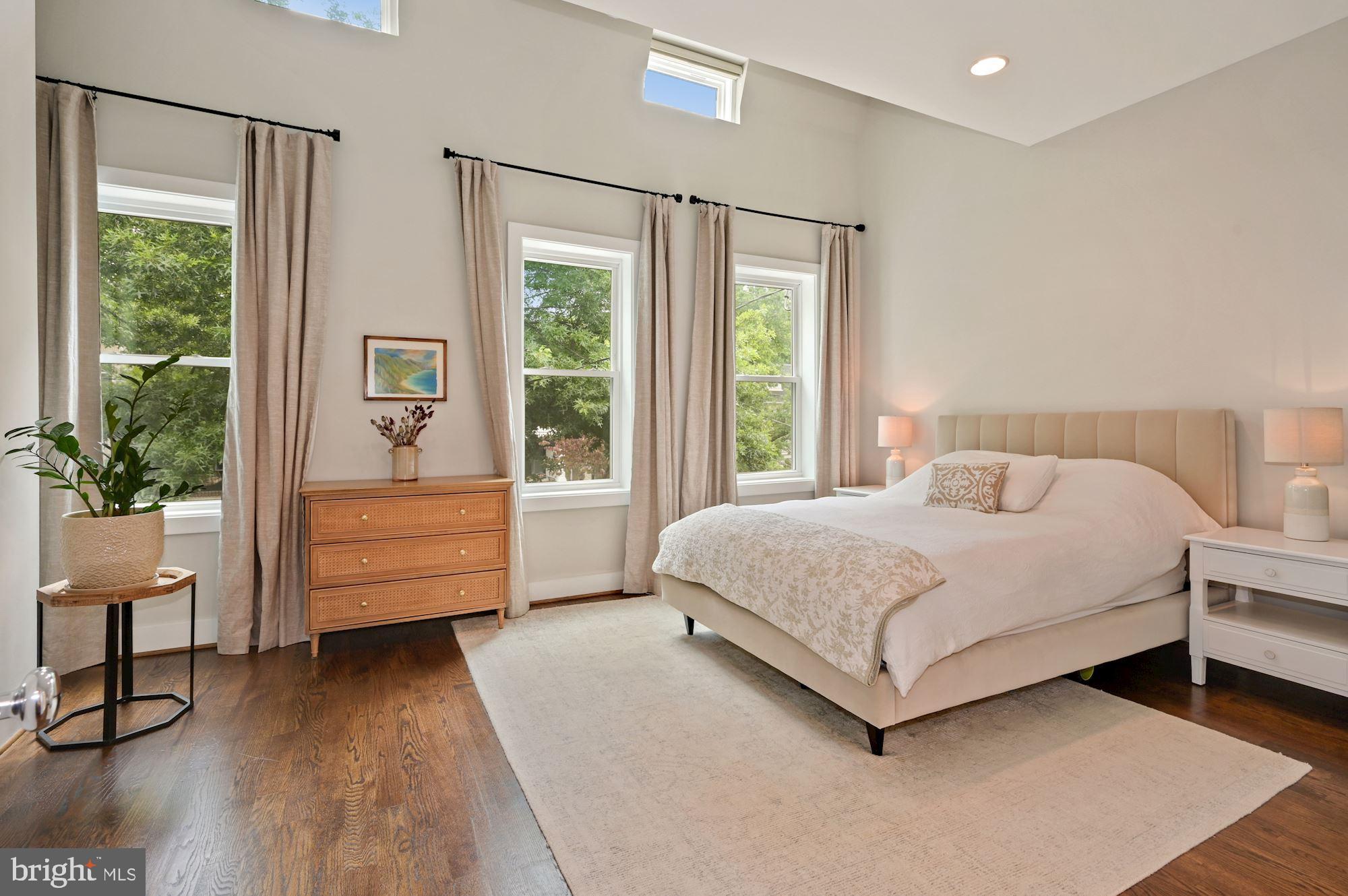 4110 3rd Street Northwest Washington, DC 20011 - Photo 17 of 35 a bed room with a bed and a chair