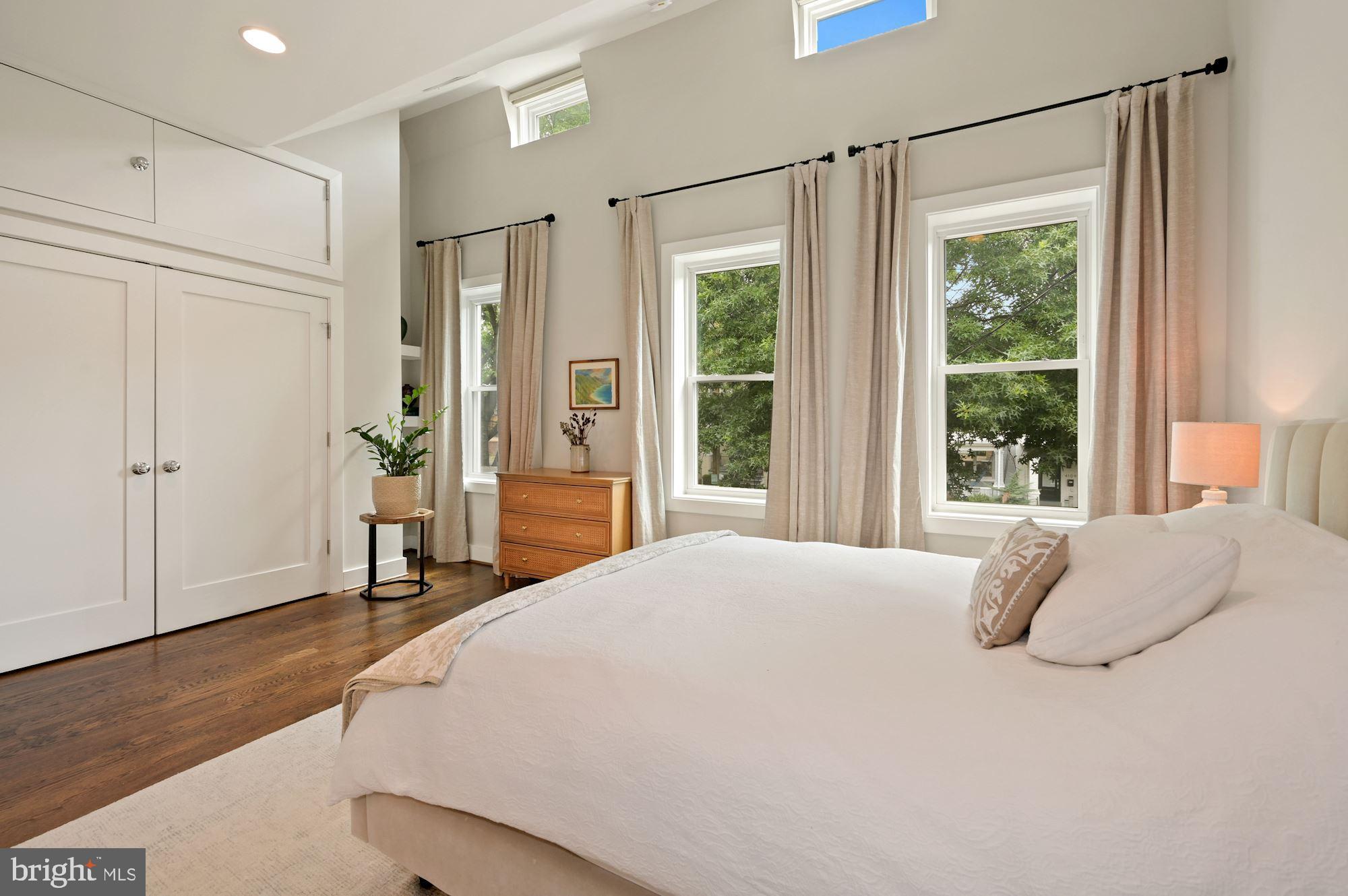 4110 3rd Street Northwest Washington, DC 20011 - Photo 18 of 35 a bedroom with a bed and a window