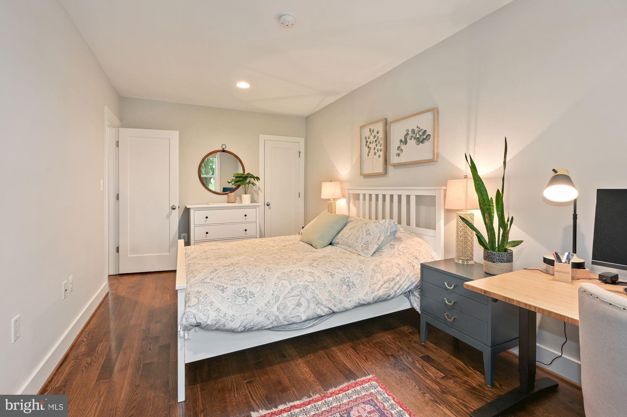 4110 3rd Street Northwest Washington, DC 20011 - Photo 22 of 35 a bedroom with a bed and a dresser in it