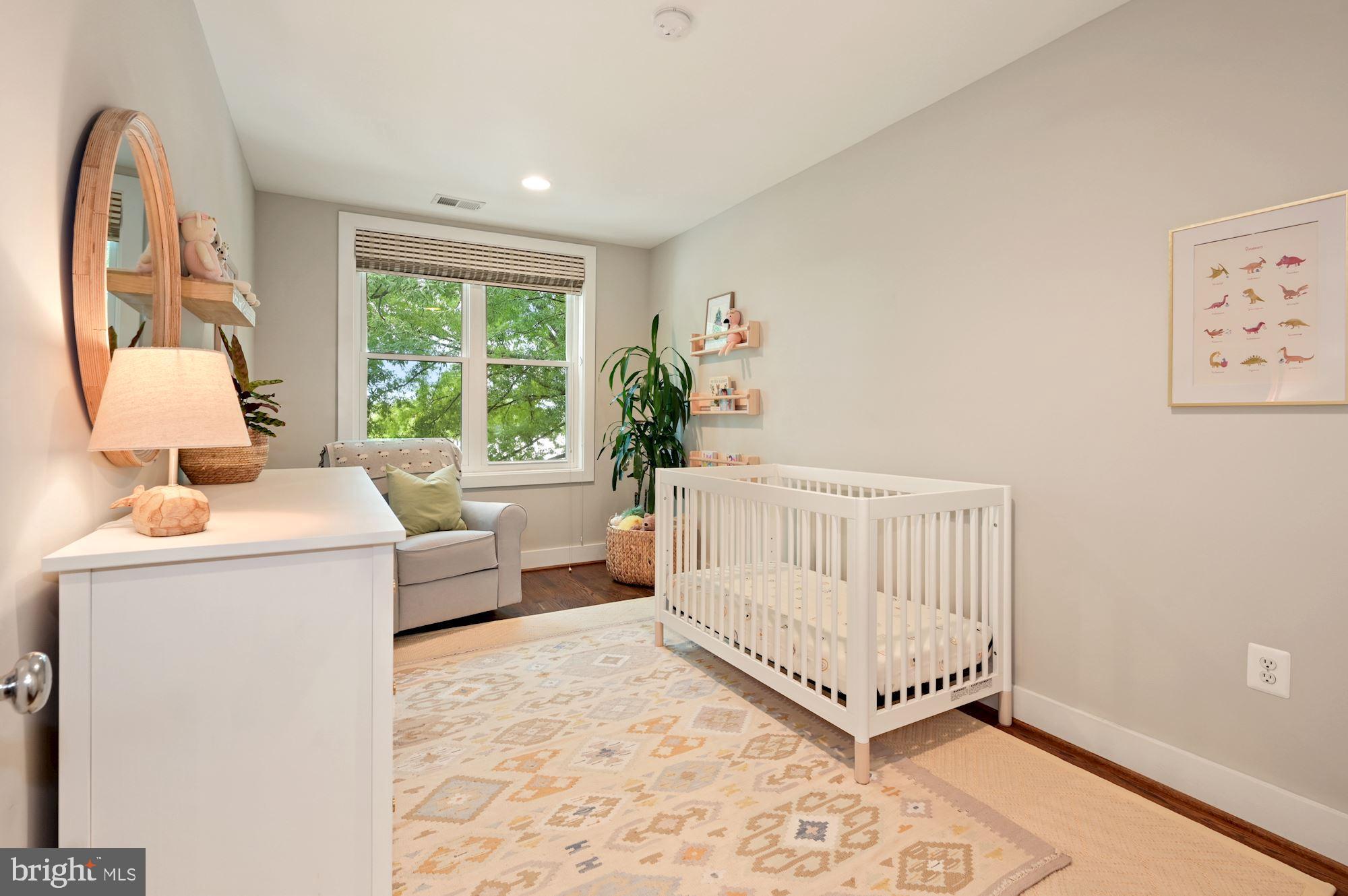 4110 3rd Street Northwest Washington, DC 20011 - Photo 23 of 35 a living room with a couch and a table