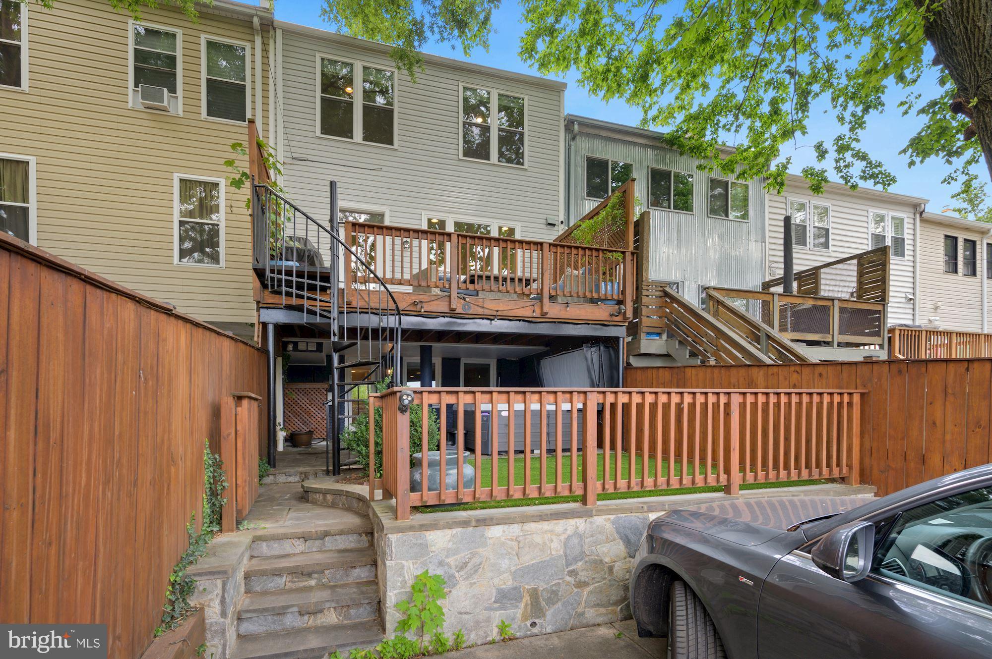4110 3rd Street Northwest Washington, DC 20011 - Photo 34 of 35 a view of a house with wooden deck and furniture