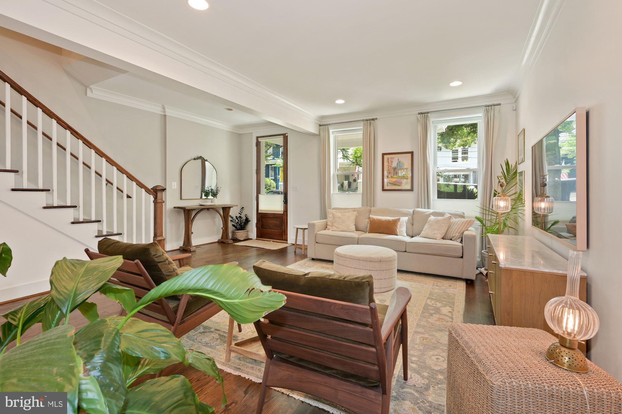 4110 3rd Street Northwest Washington, DC 20011 - Photo 8 of 35 a living room with fireplace furniture and a large window