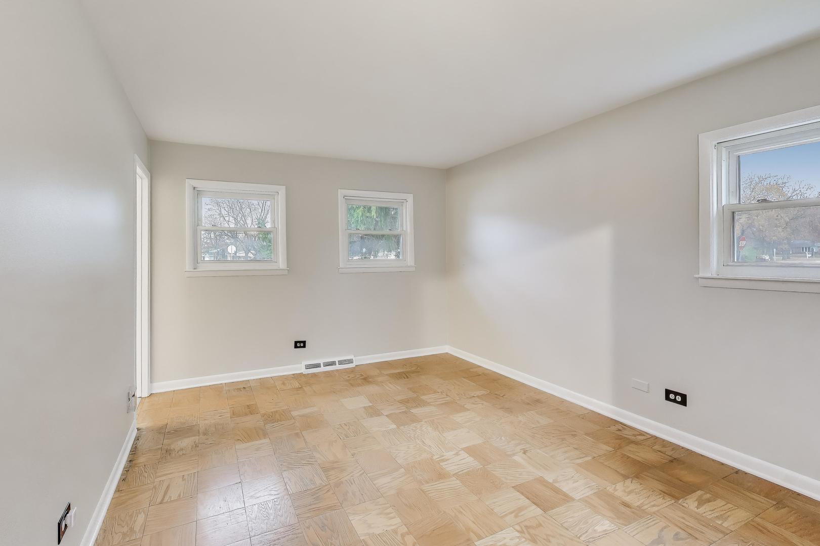 400 Landmeier Road Elk Grove Village, IL 60007 - Photo 16 of 33 a view of an empty room with a window