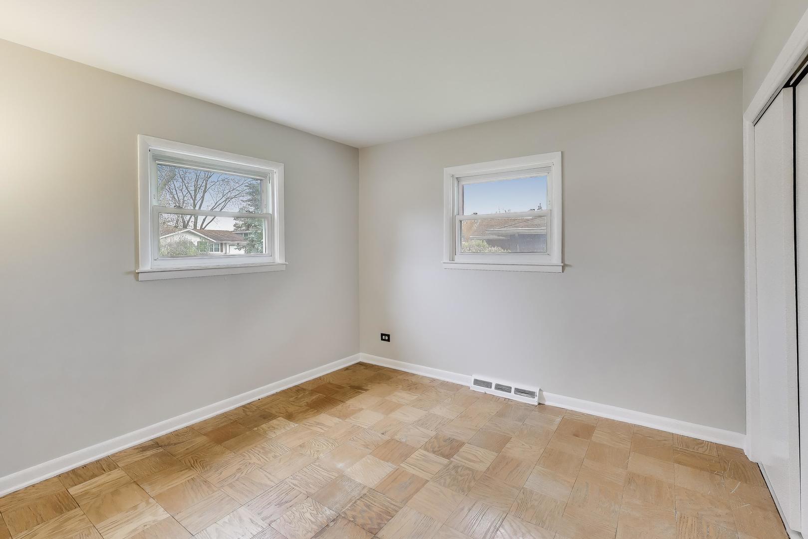400 Landmeier Road Elk Grove Village, IL 60007 - Photo 24 of 33 a view of an empty room with a window