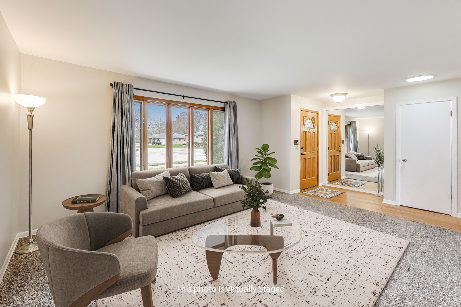 400 Landmeier Road Elk Grove Village, IL 60007 - Photo 4 of 33 a living room with furniture and wooden floor